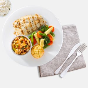 Grilled salmon fillet with salad